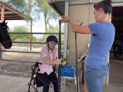 A student selects her reins