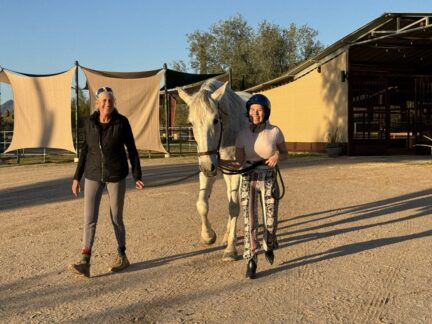 Amanda leading Barbara to paddock with Roz.